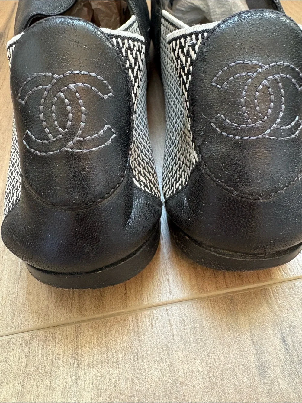 CHANEL Black Leather Camellia Slip-On Flats